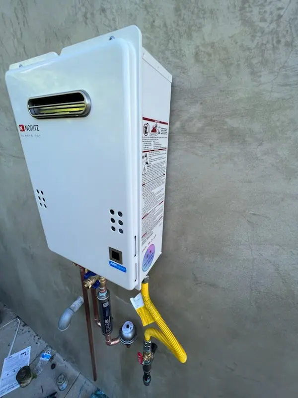 Tankless water heater installation for Booth-Boyd homes